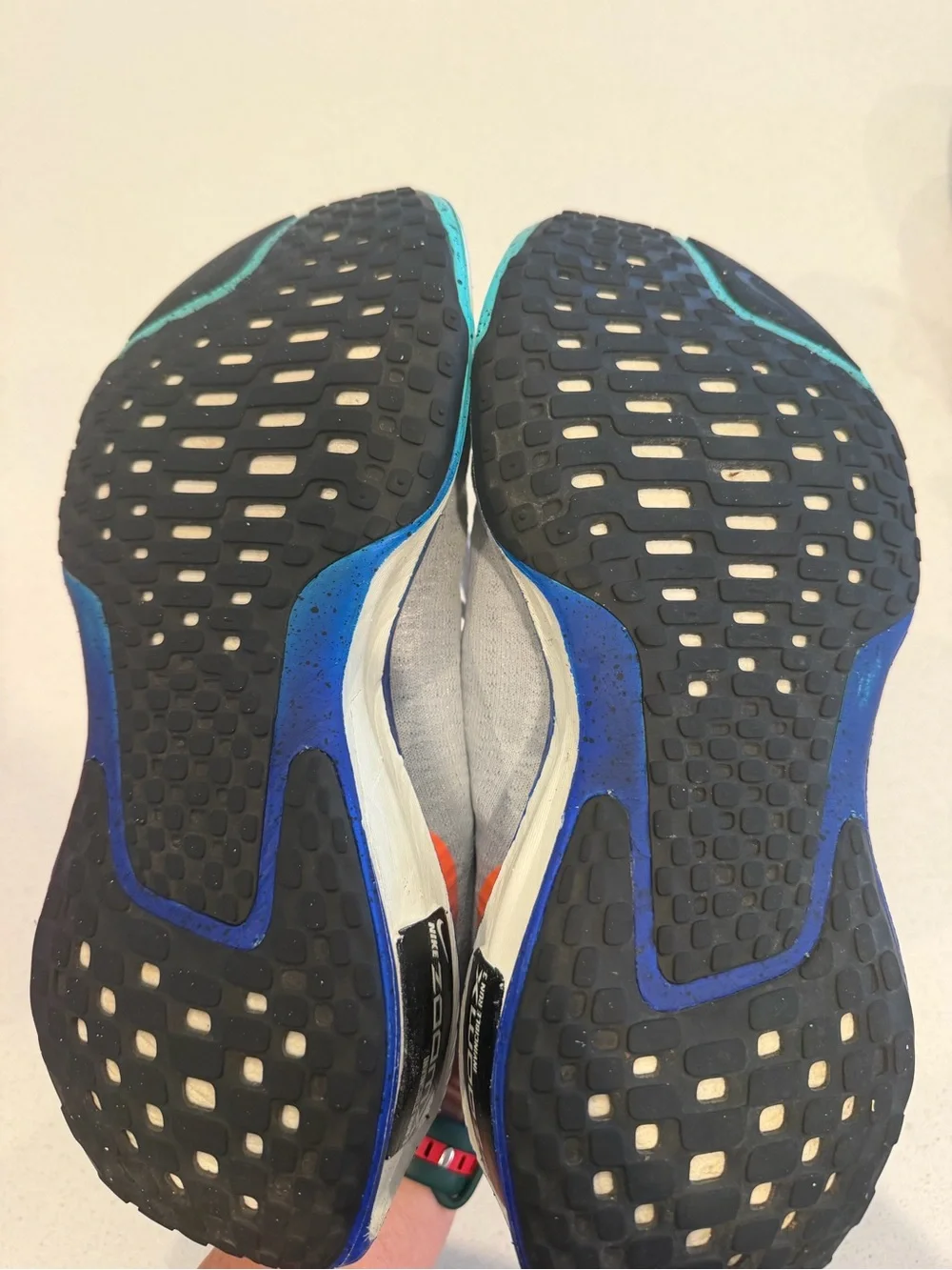 Nike Mens size 8 or Women’s 9.5 Grey ZoomX Invincible Sneakers with Blue Accents